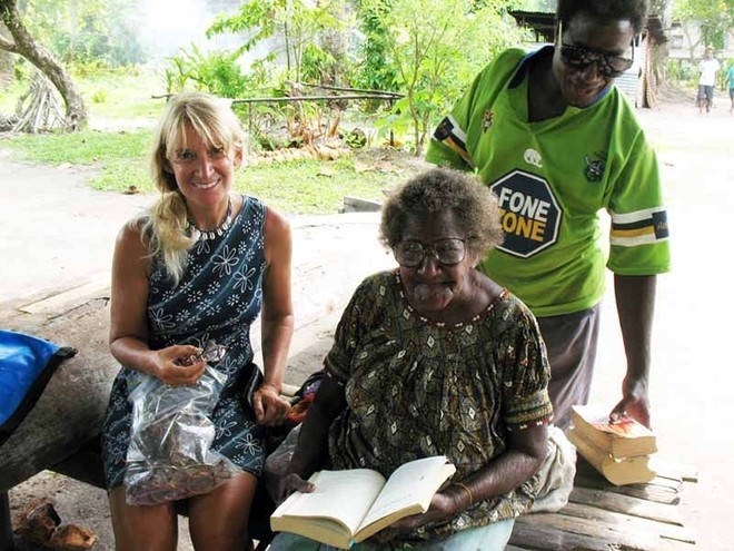 9. This lady was very happy to be able to read the Bible again after many years - OceansWatch returns to Papua New Guinea © Chris Bone